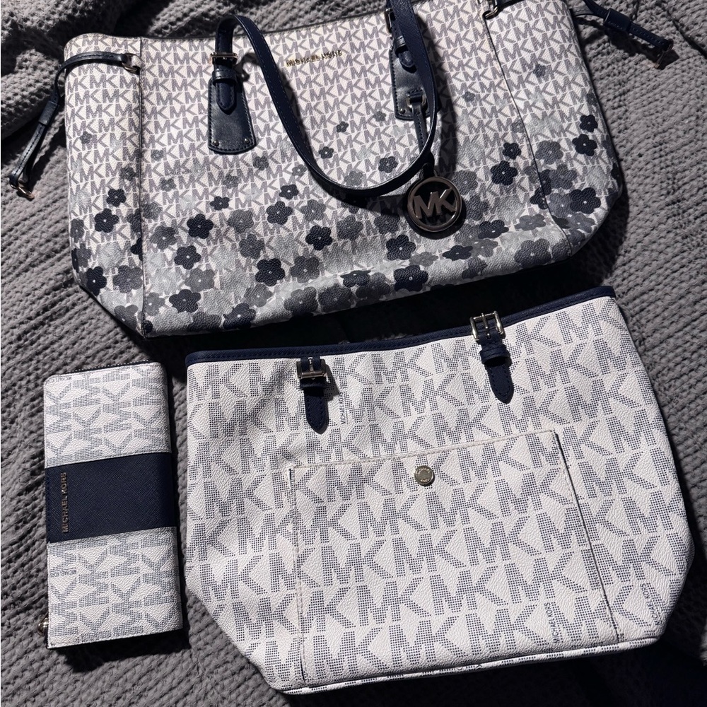 Michael Kors Gray and Navy blue purses one set of straps interchangeable